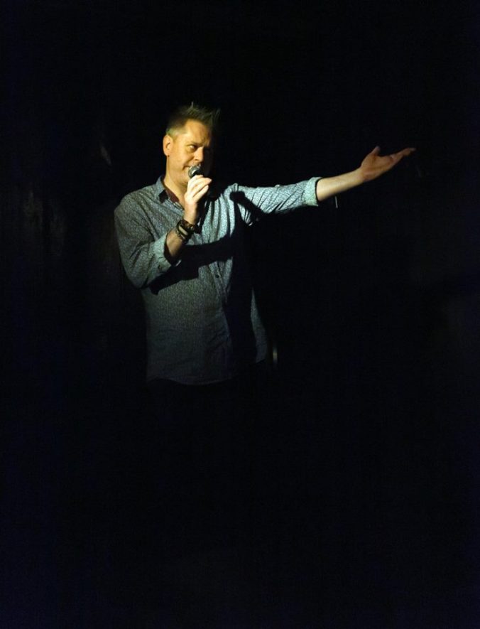 The Curator introducing Robin Askwith